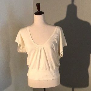 Low front short sleeve sweater
